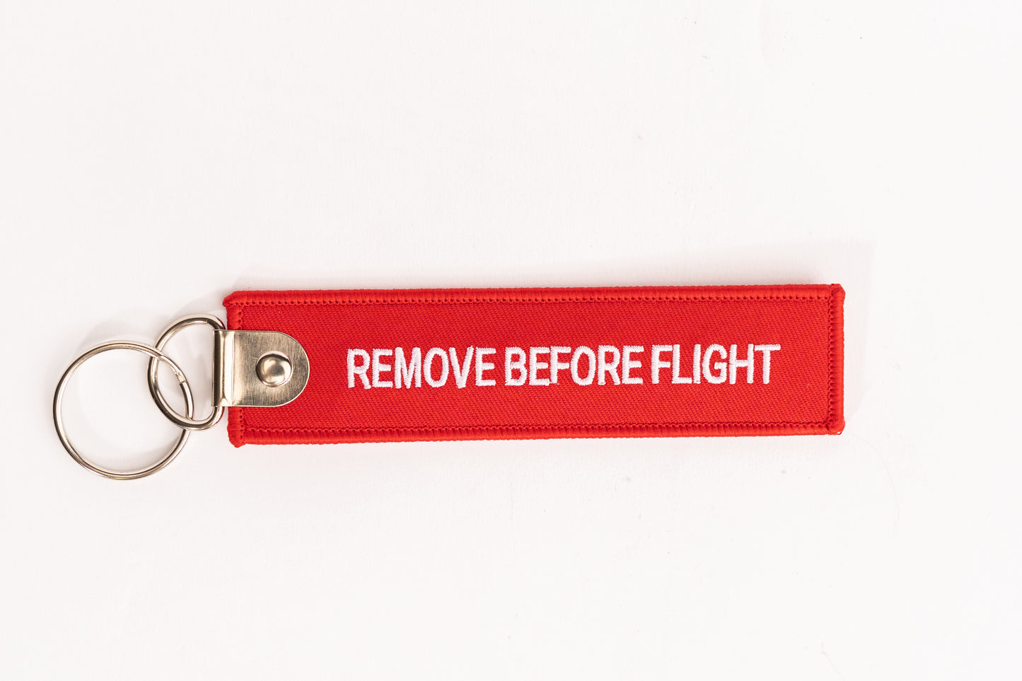 Brussels Airlines “Remove Before Flight” Key Ring, Red